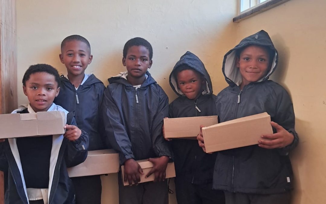 Windbreakers, shoes and socks… and a little truck to carry it all!